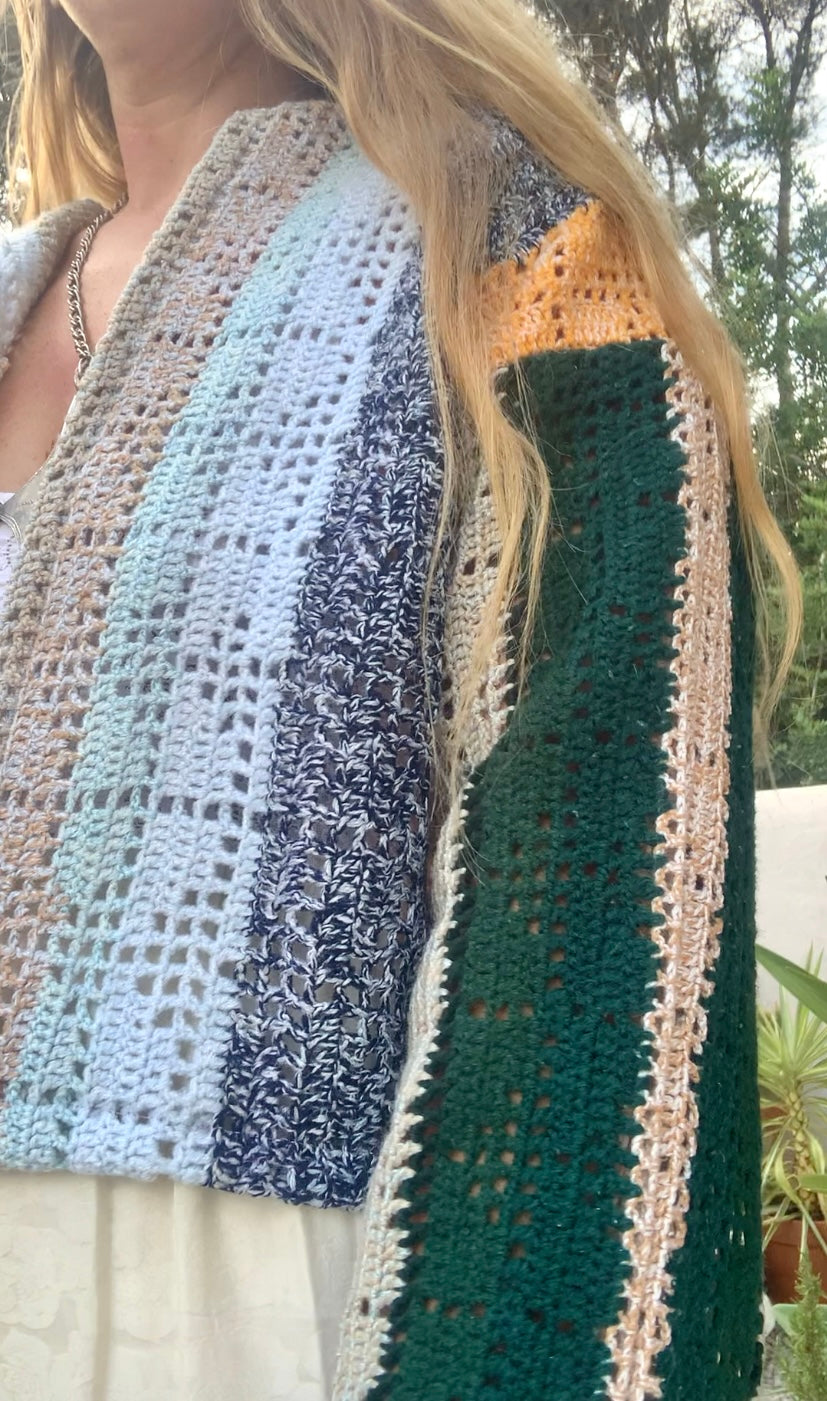 Up-cycled vintage crochet cropped jacket made by Vagabond Ibiza with pastel tones.