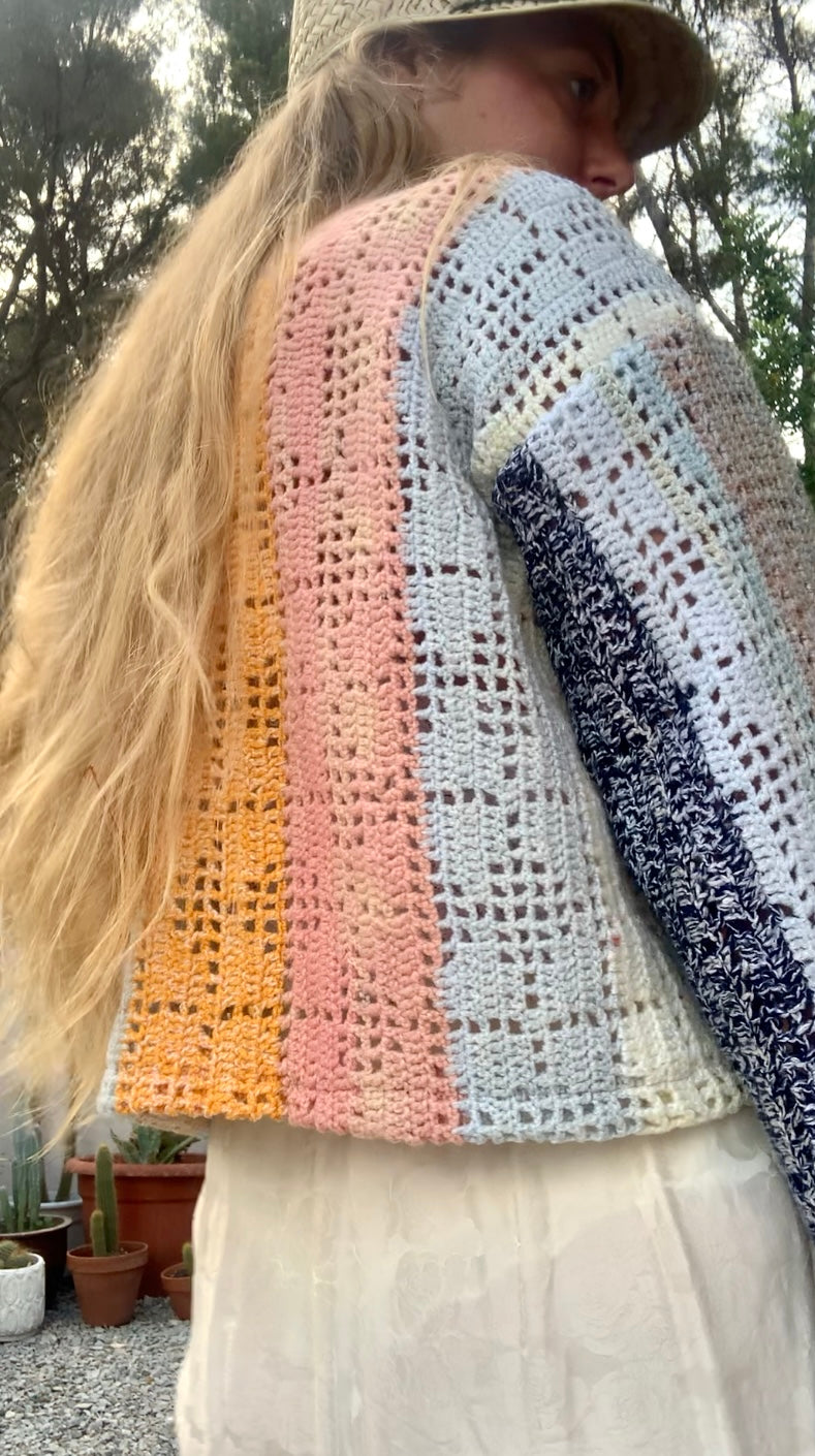Up-cycled vintage crochet cropped jacket made by Vagabond Ibiza with pastel tones.