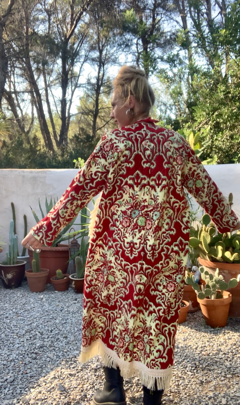 Vintage red and pastel yellow textiles with a burnet out devore Damascus pattern on the velvets pile very special textiles with tassel trim