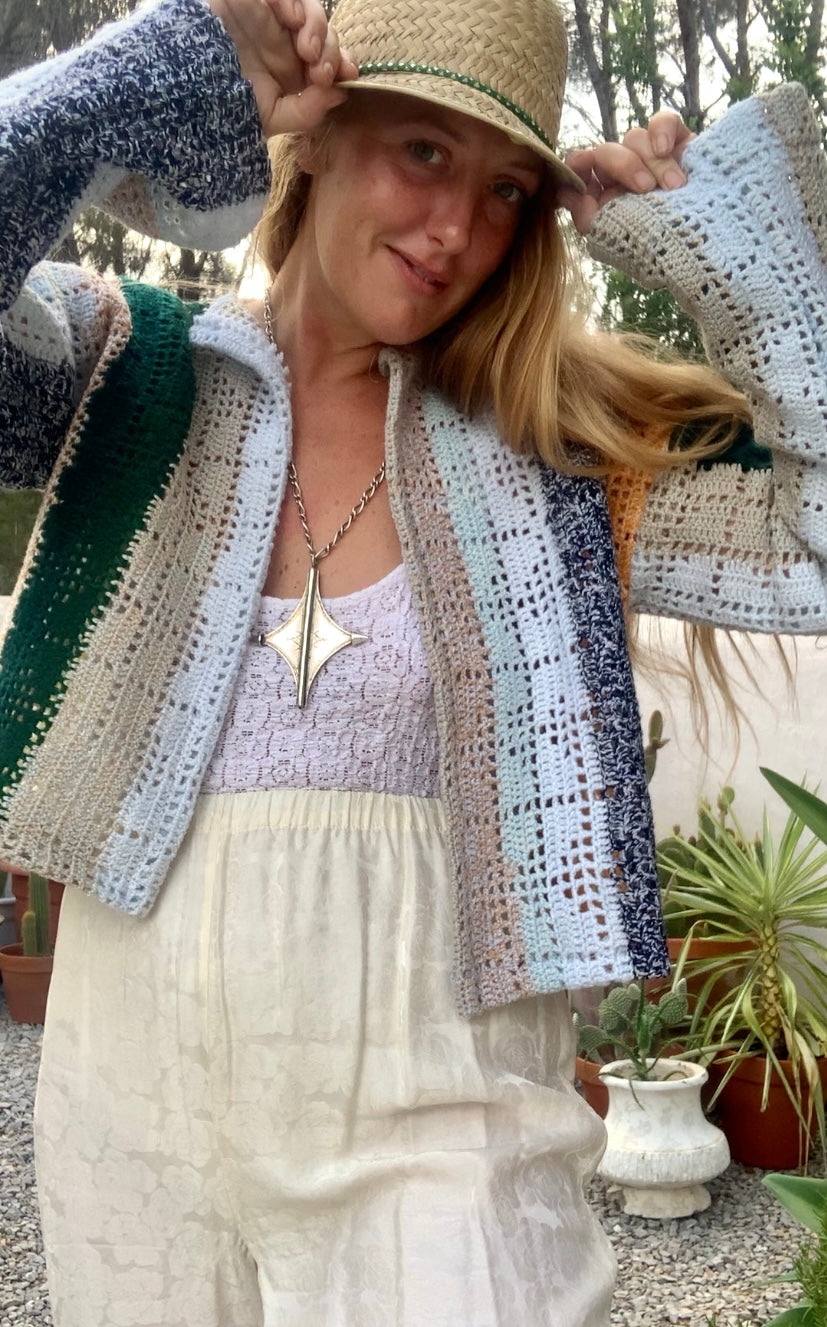 Up-cycled vintage crochet cropped jacket made by Vagabond Ibiza with pastel tones.