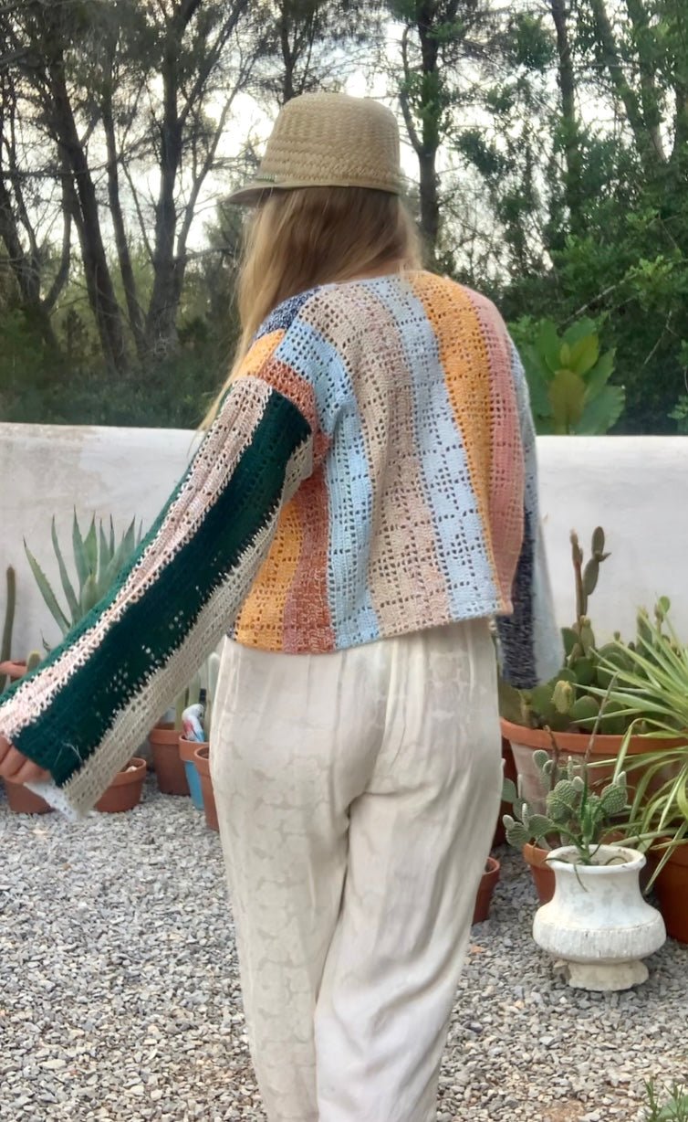 Up-cycled vintage crochet cropped jacket made by Vagabond Ibiza with pastel tones.