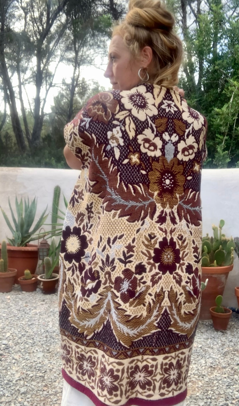 Up-cycled vintage blanket waistcoat jackets by Vagabond Ibiza with a brown and cream woven outside textiles lined with patterns fleece
