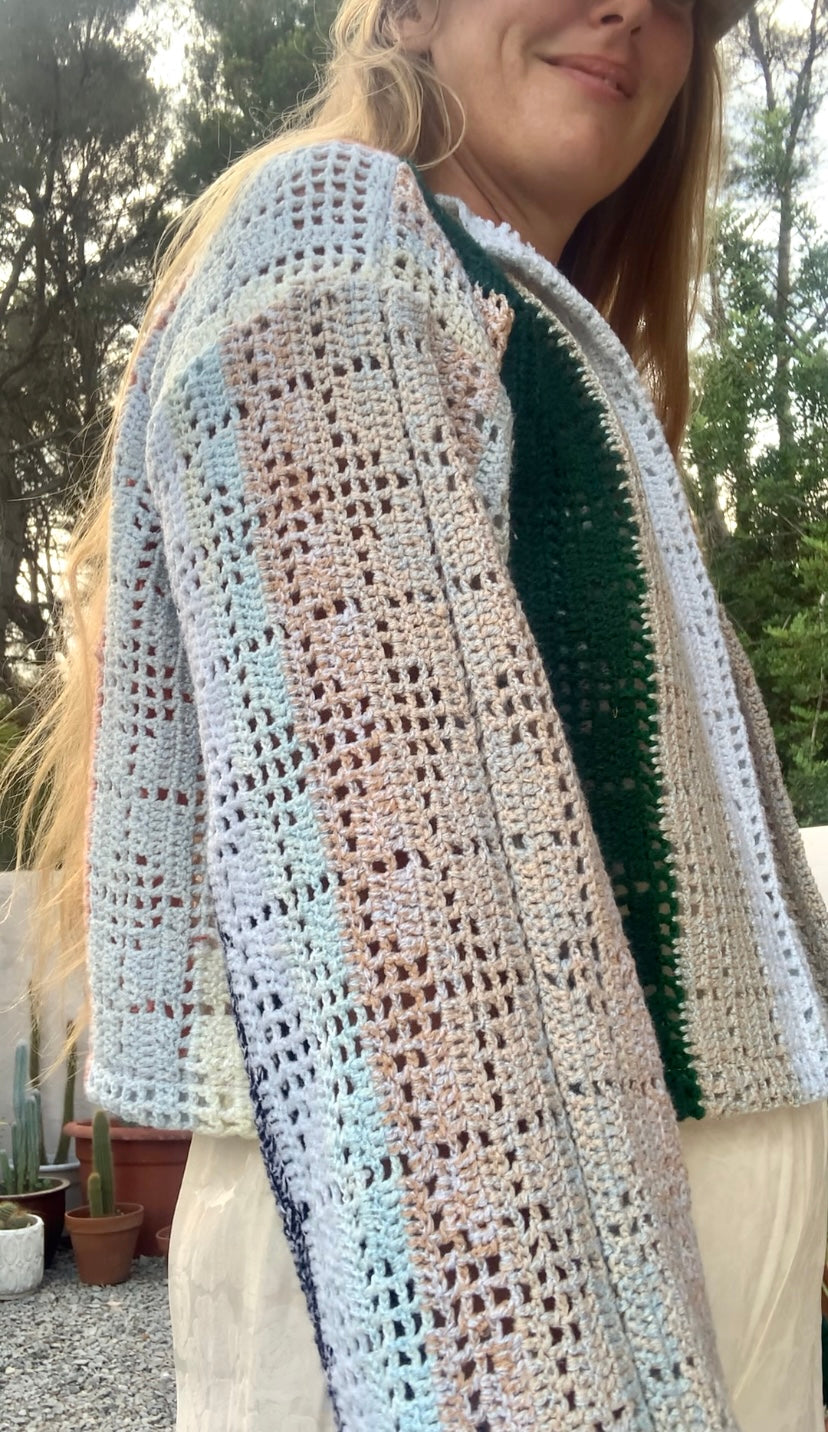 Up-cycled vintage crochet cropped jacket made by Vagabond Ibiza with pastel tones.