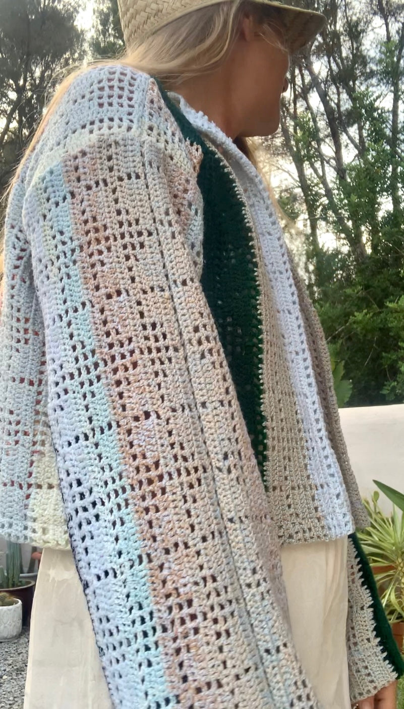 Up-cycled vintage crochet cropped jacket made by Vagabond Ibiza with pastel tones.