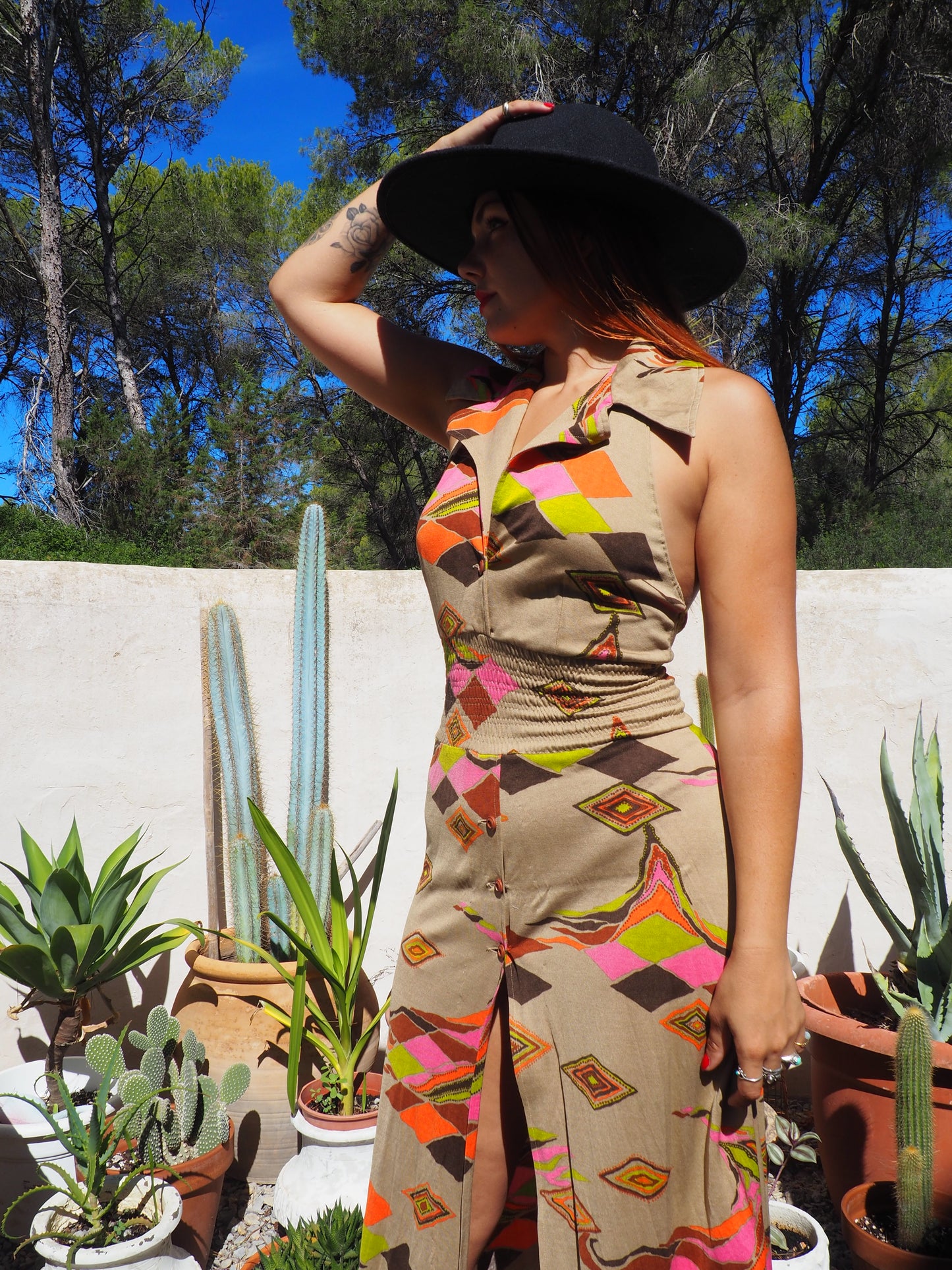 Vintage 1970’s super cool abstract printed maxi dress with a halter neck and cool collar details.