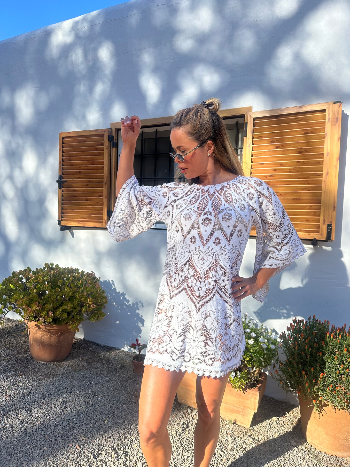 White vintage lace upcycled bell sleeve dress made by Vagabond Ibiza