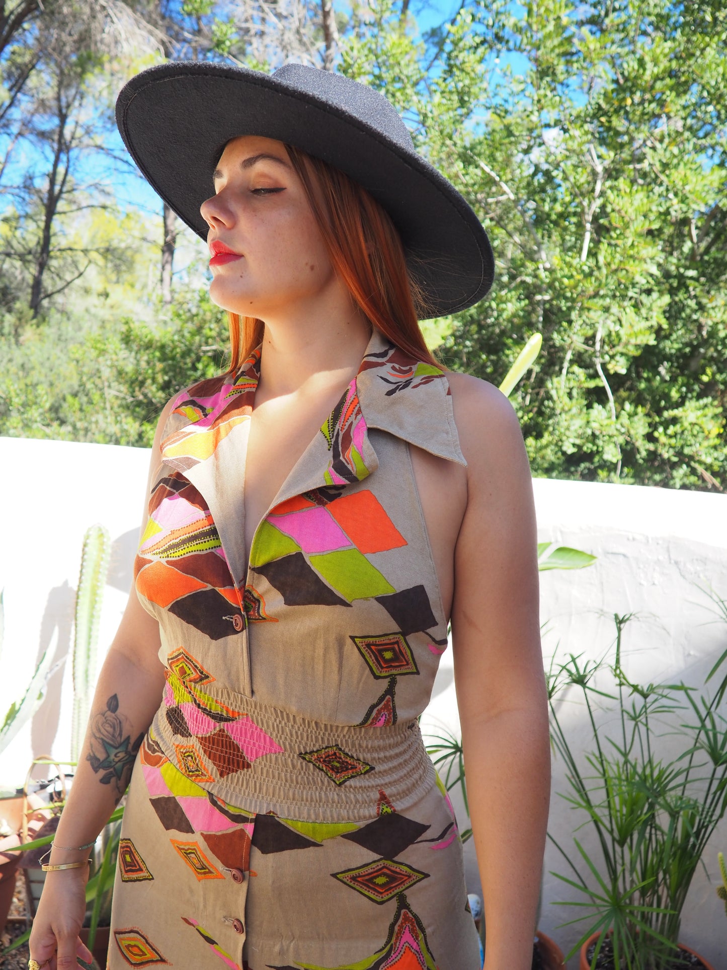 Vintage 1970’s super cool abstract printed maxi dress with a halter neck and cool collar details.