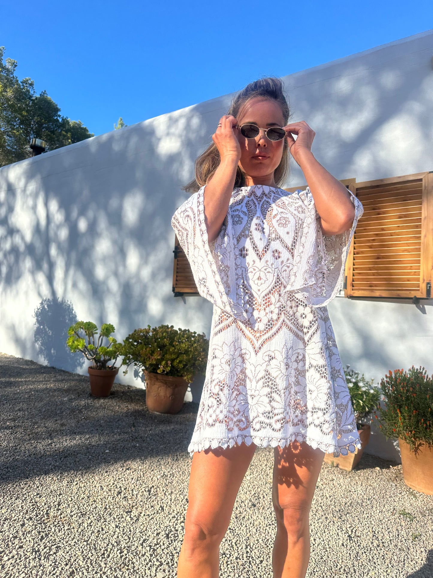 White vintage lace upcycled bell sleeve dress made by Vagabond Ibiza