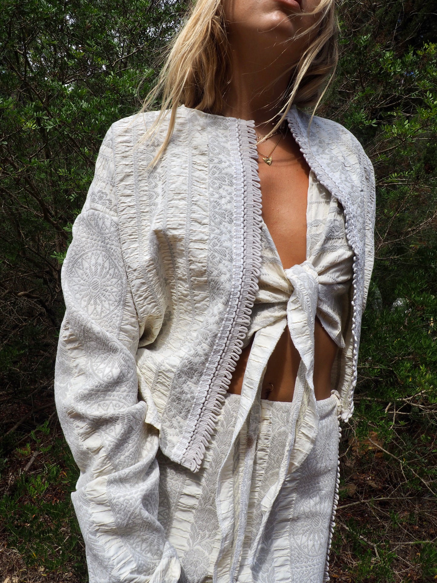 Up-cycled heavy cotton woven textile cropped jacket with super cool oversize long sleeves can be worn long as a statement made by Vagabond Ibiza