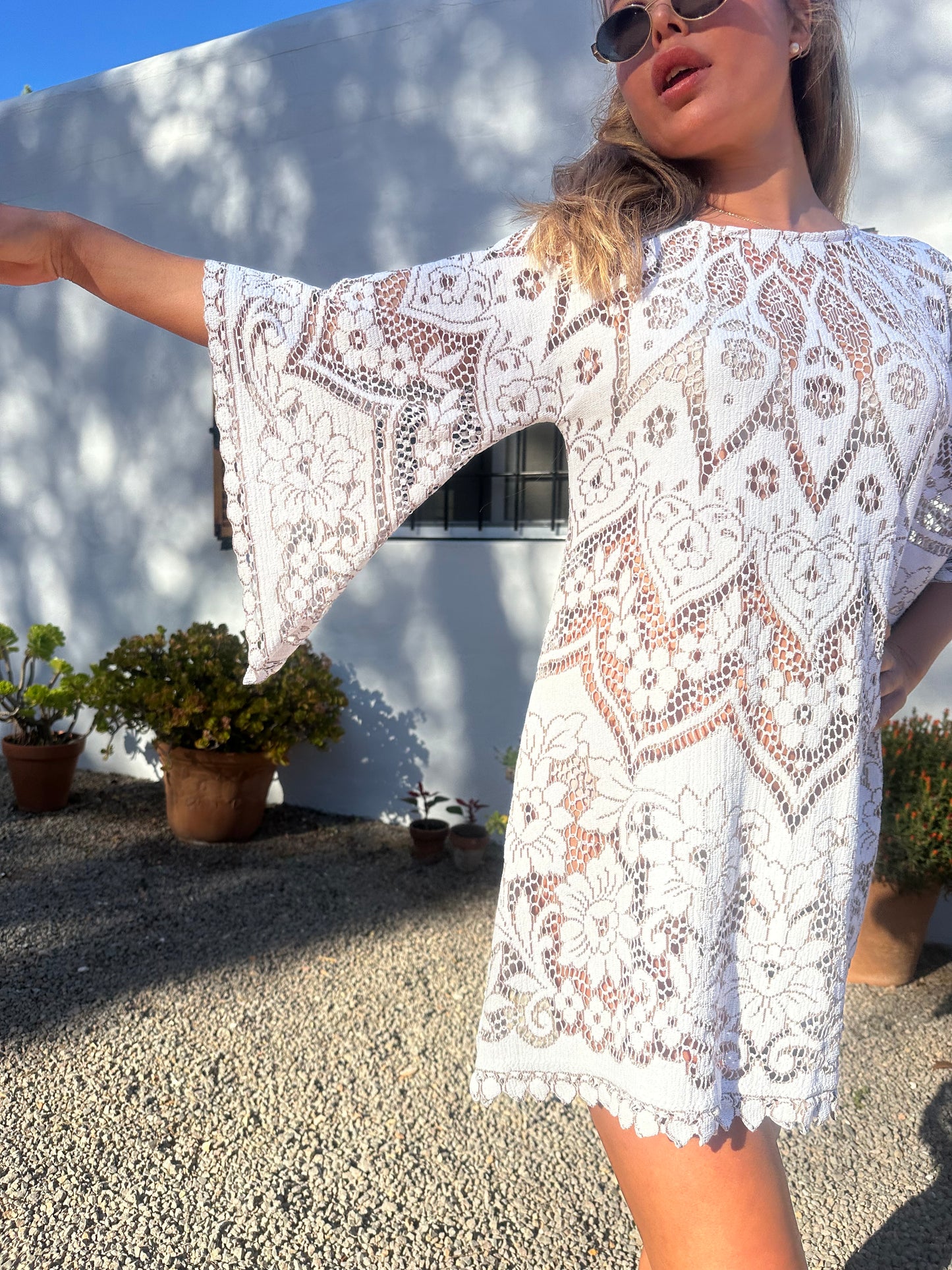 White vintage lace upcycled bell sleeve dress made by Vagabond Ibiza