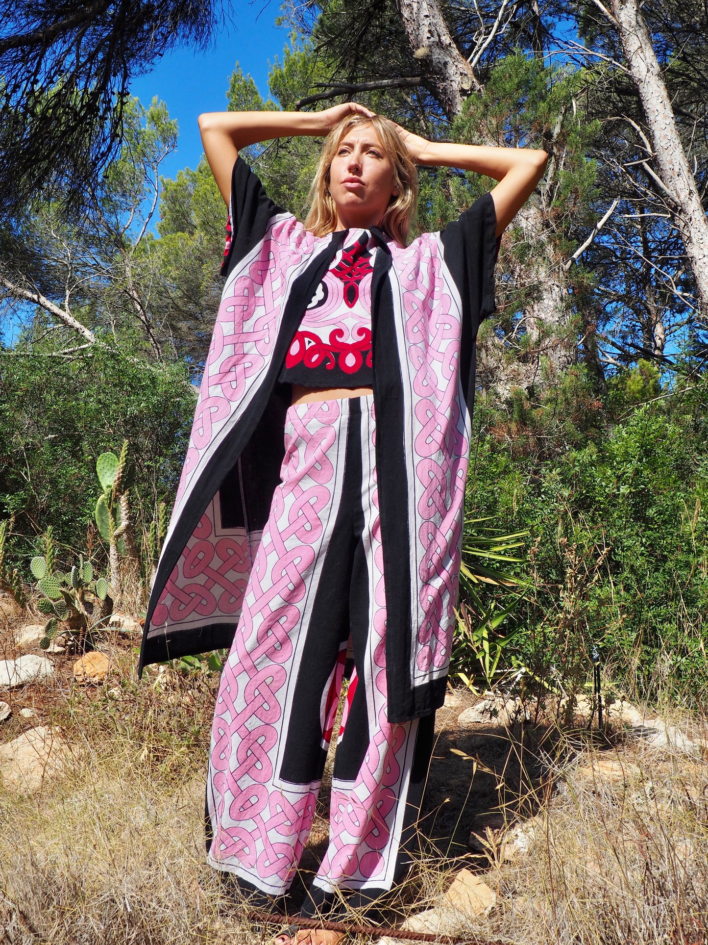 Up-cycled cotton short sleeve kimono jacket in pink and black with vibrant print design and circular motifs by Vagabond Ibiza