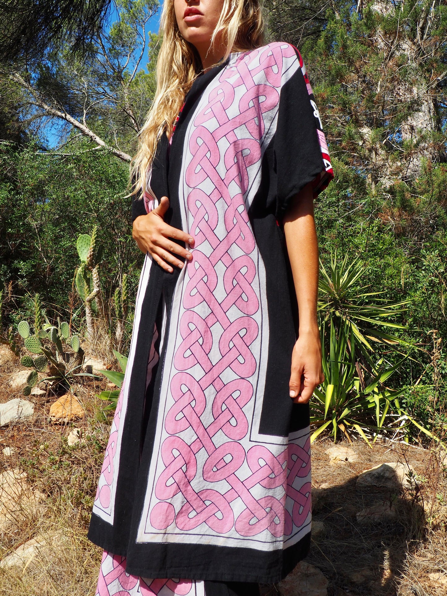 Up-cycled cotton short sleeve kimono jacket in pink and black with vibrant print design and circular motifs by Vagabond Ibiza
