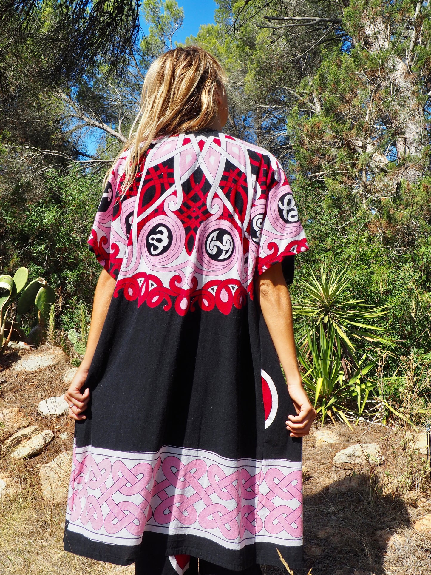 Up-cycled cotton short sleeve kimono jacket in pink and black with vibrant print design and circular motifs by Vagabond Ibiza