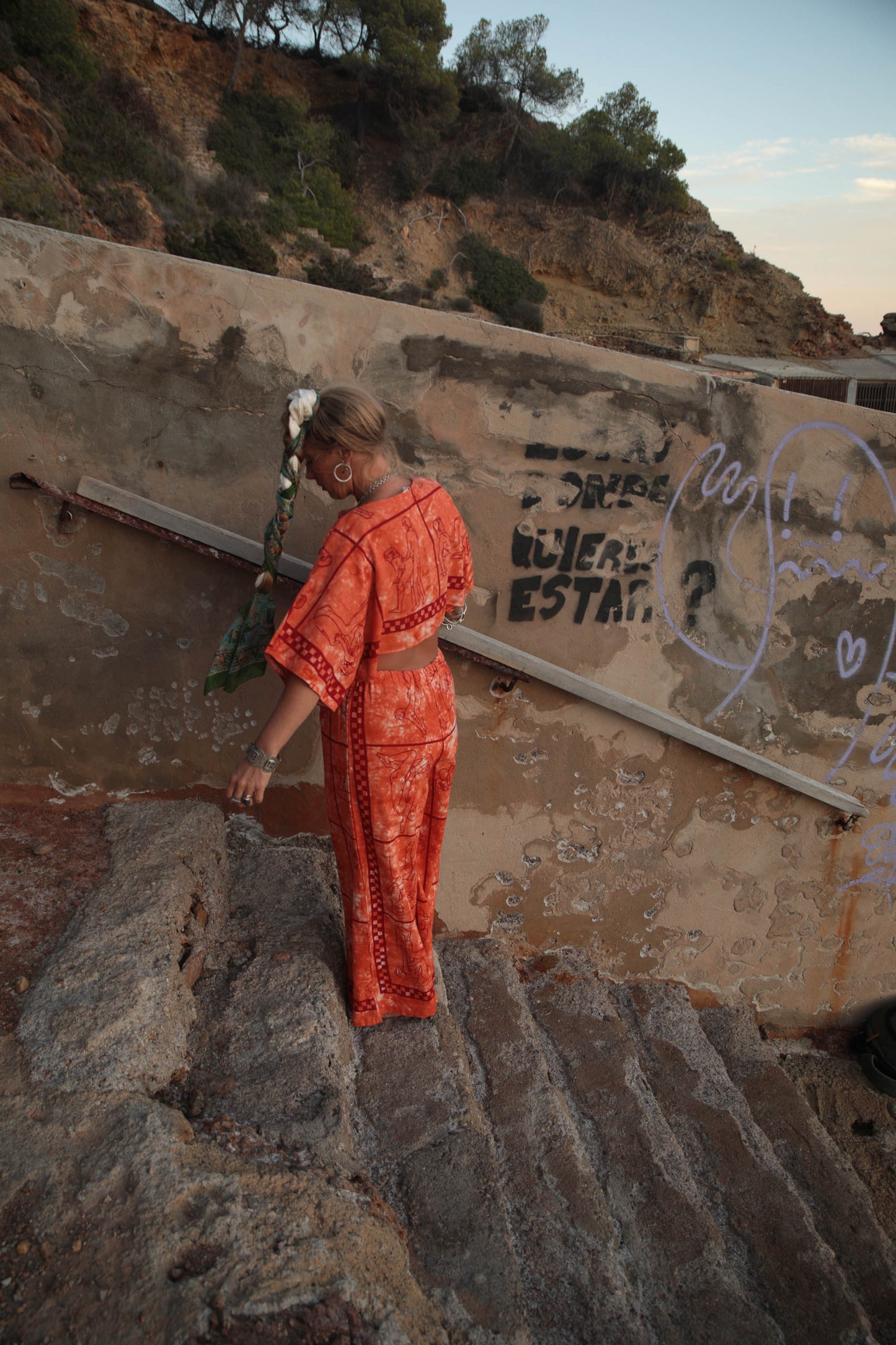 Up-cycled vintage cotton 2 piece set top and pants with printed karma sutra design in bright orange.