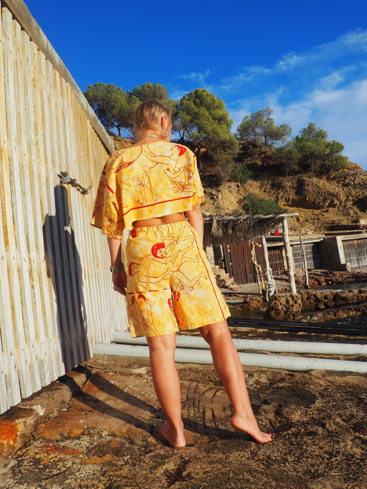 Up-cycled vintage cotton reversible crop top with printed karma sutra design in mellow yellow.