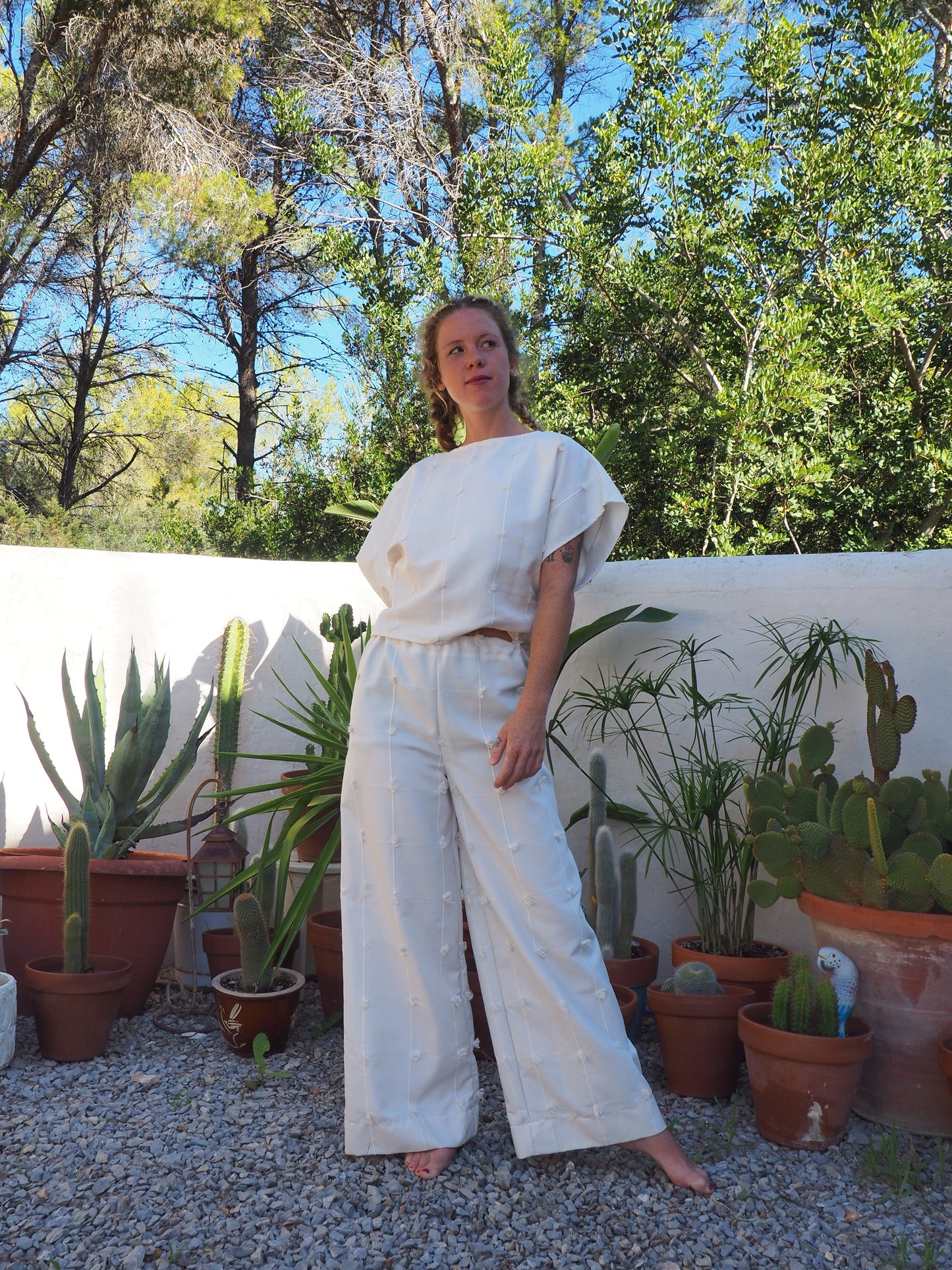 Creamy, white woven 2 piece wide leg pant and top set up-cycled by Vagabond Ibiza