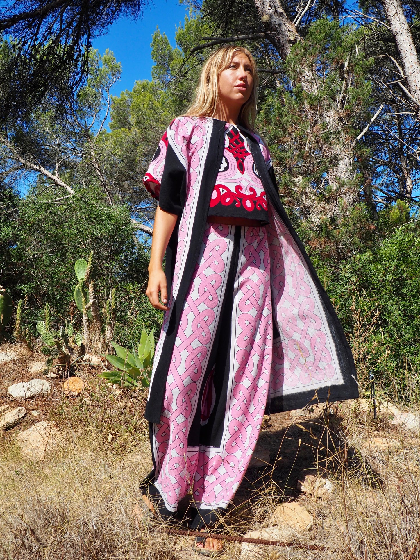 Up-cycled cotton short sleeve kimono jacket in pink and black with vibrant print design and circular motifs by Vagabond Ibiza