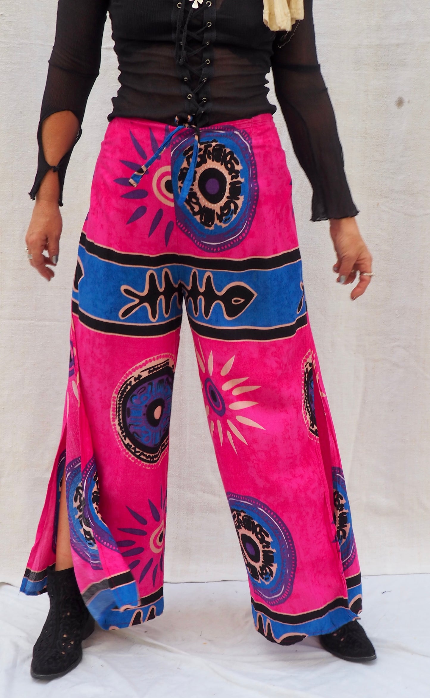 Wrap pants with side splits in pink and blue patterned design