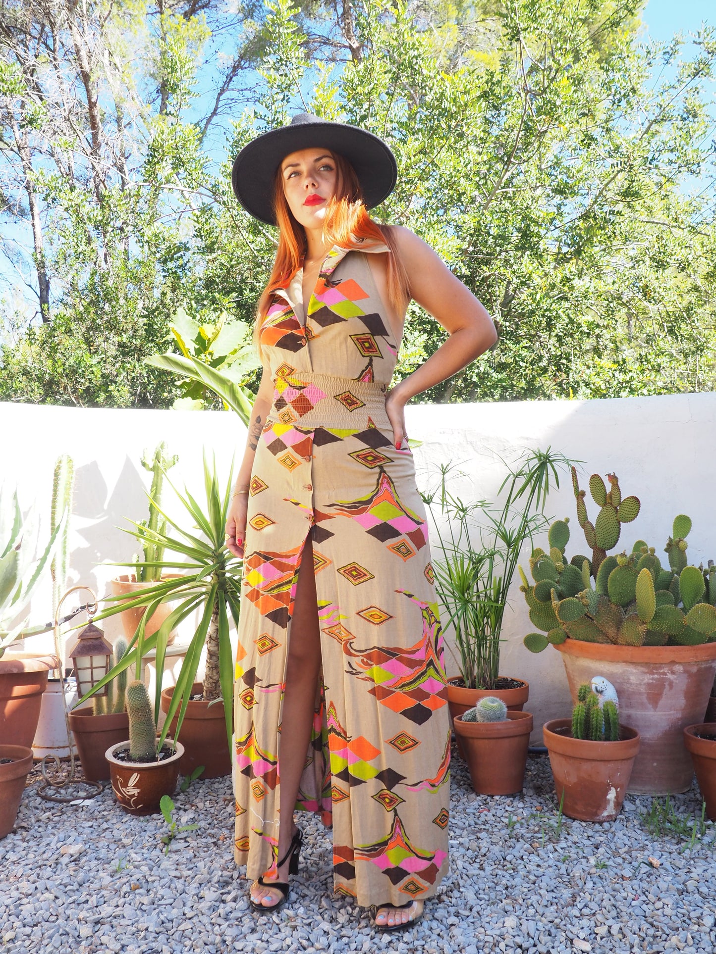 Vintage 1970’s super cool abstract printed maxi dress with a halter neck and cool collar details.