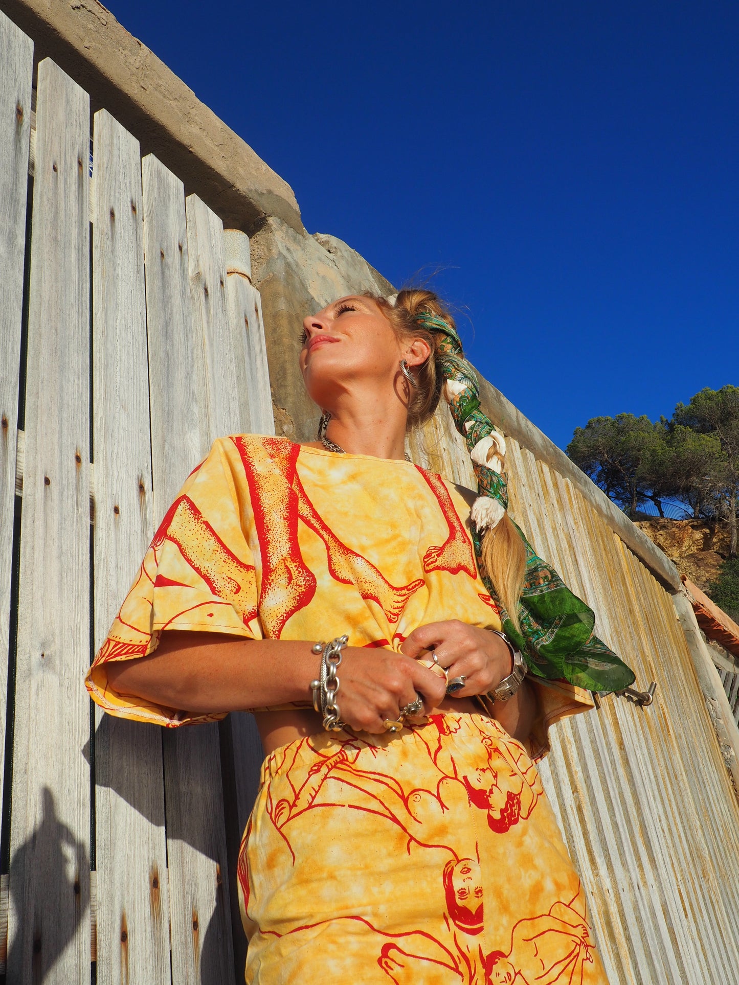 Up-cycled vintage cotton reversible crop top with printed karma sutra design in mellow yellow.