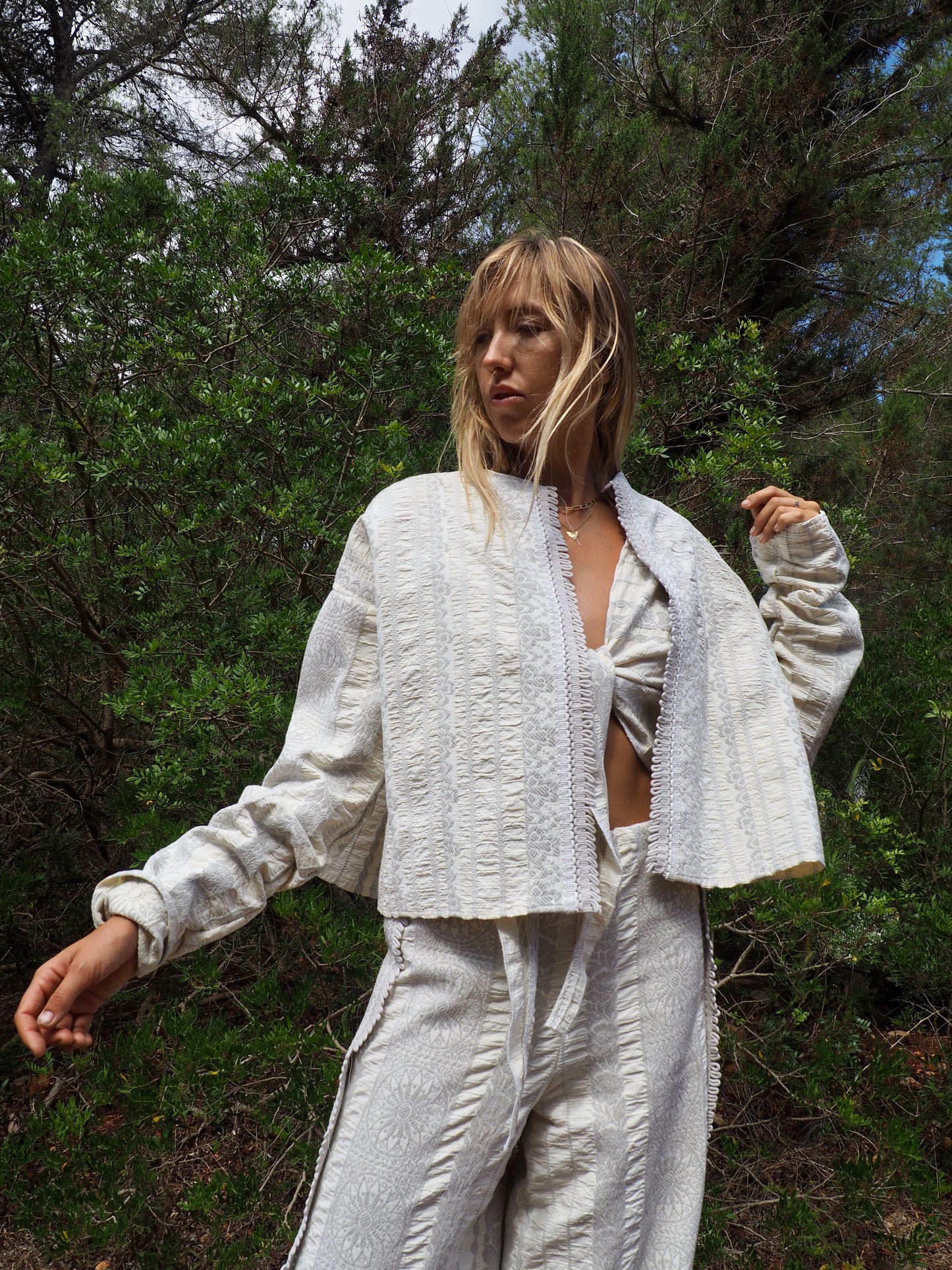 Up-cycled heavy cotton woven textile cropped jacket with super cool oversize long sleeves can be worn long as a statement made by Vagabond Ibiza