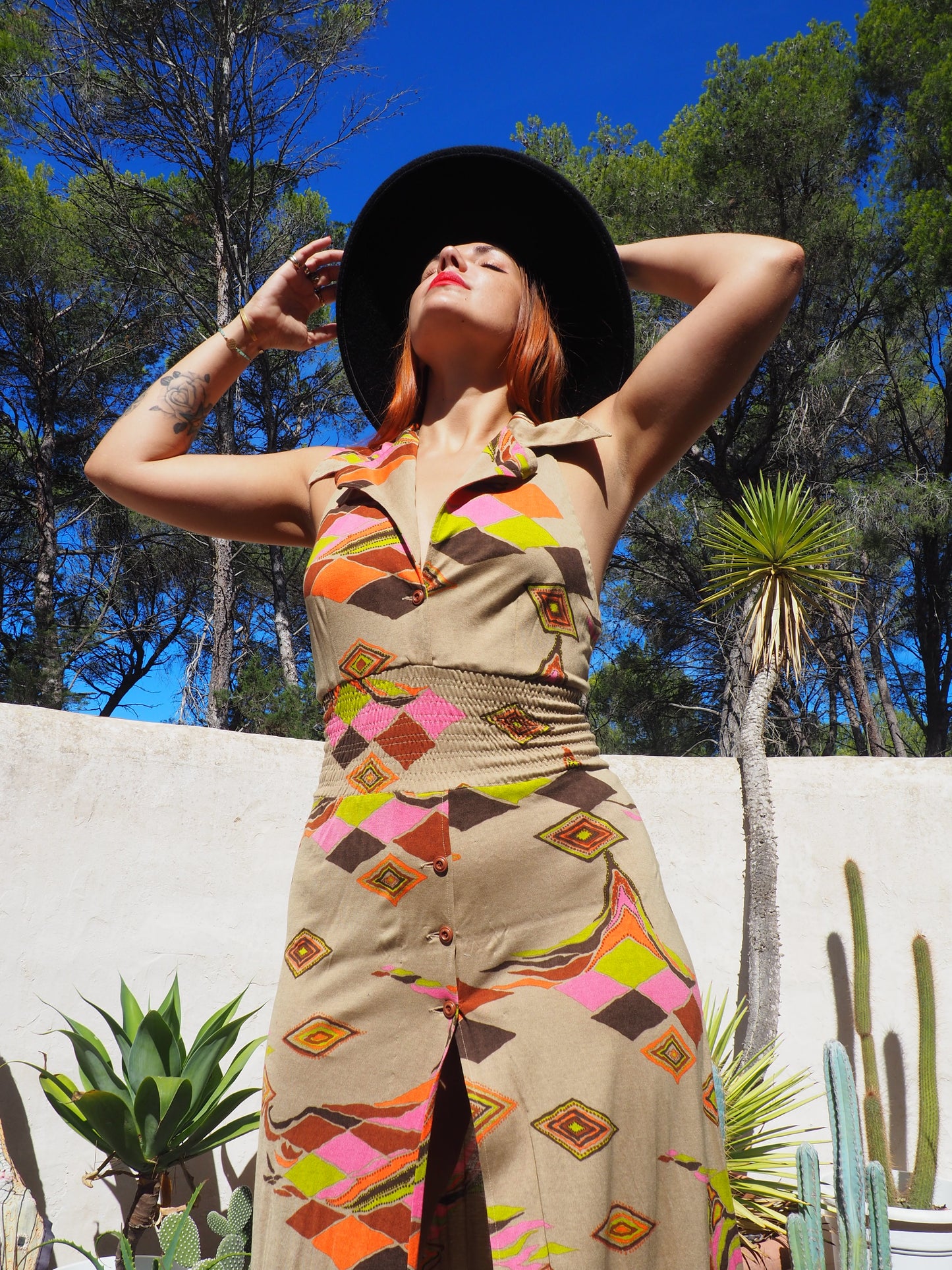 Vintage 1970’s super cool abstract printed maxi dress with a halter neck and cool collar details.