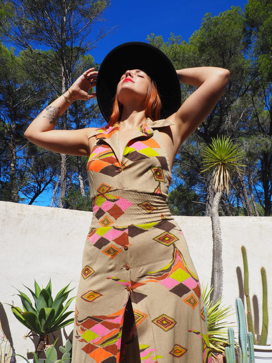 Vintage 1970’s super cool abstract printed maxi dress with a halter neck and cool collar details.