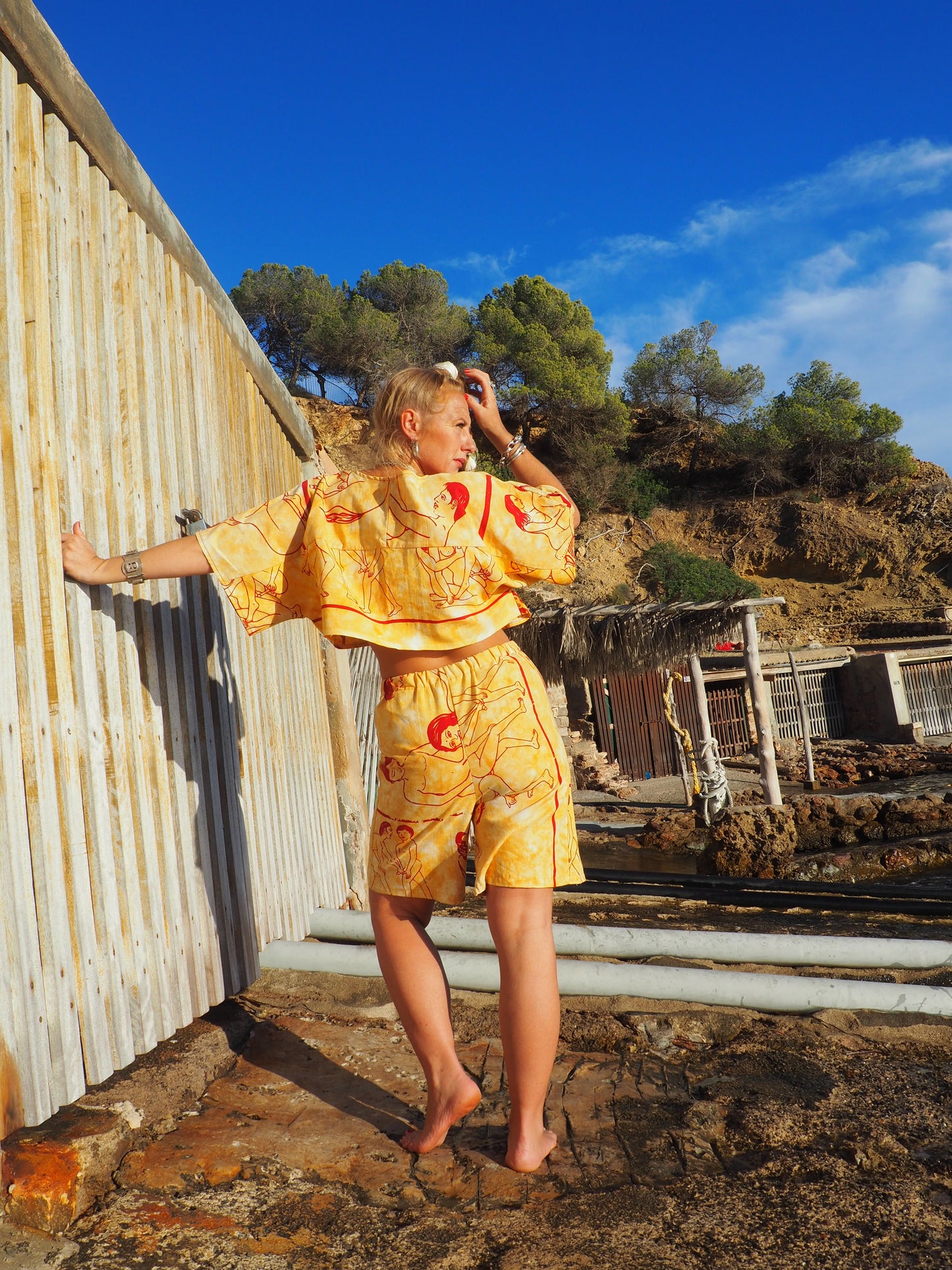 Up-cycled vintage cotton reversible crop top with printed karma sutra design in mellow yellow.