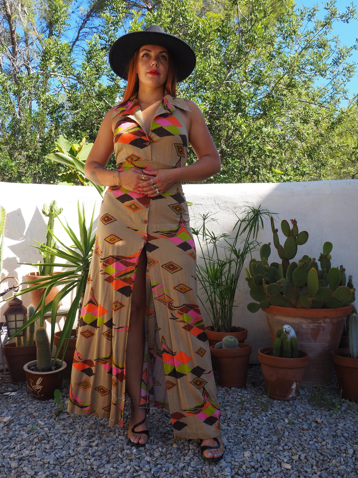 Vintage 1970’s super cool abstract printed maxi dress with a halter neck and cool collar details.