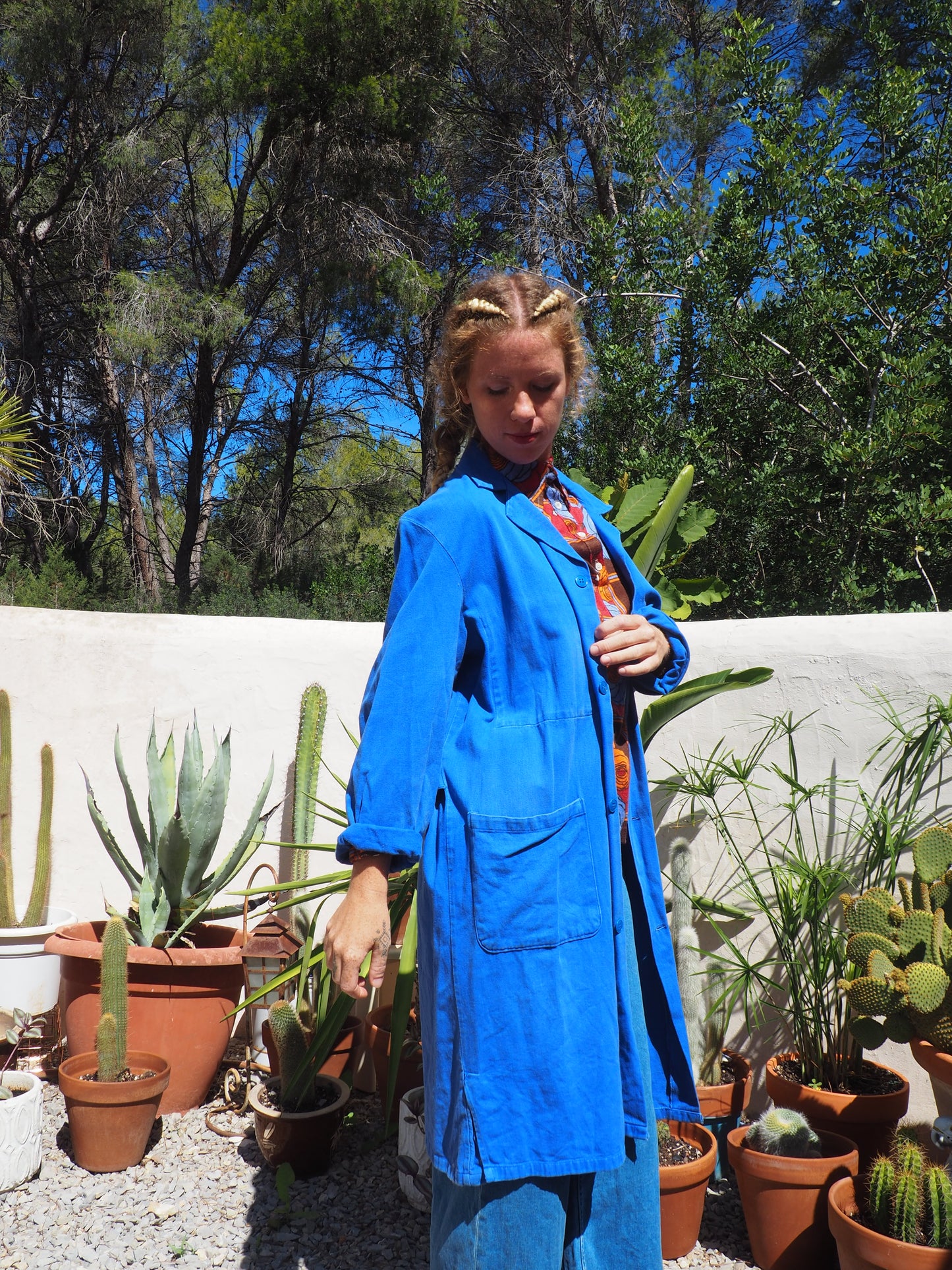 Vintage French blue cotton long work wear jacket with pockets and buttons up the front super cool
