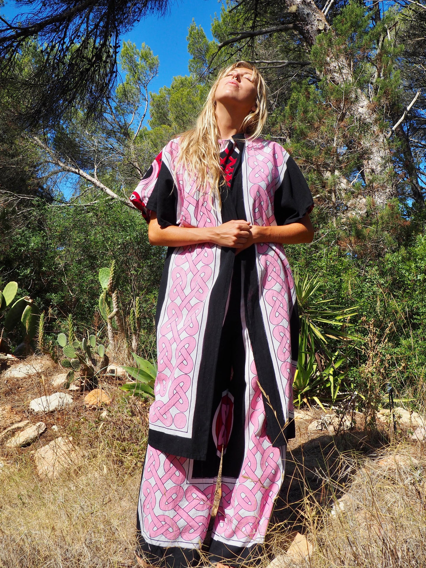 Up-cycled cotton short sleeve kimono jacket in pink and black with vibrant print design and circular motifs by Vagabond Ibiza
