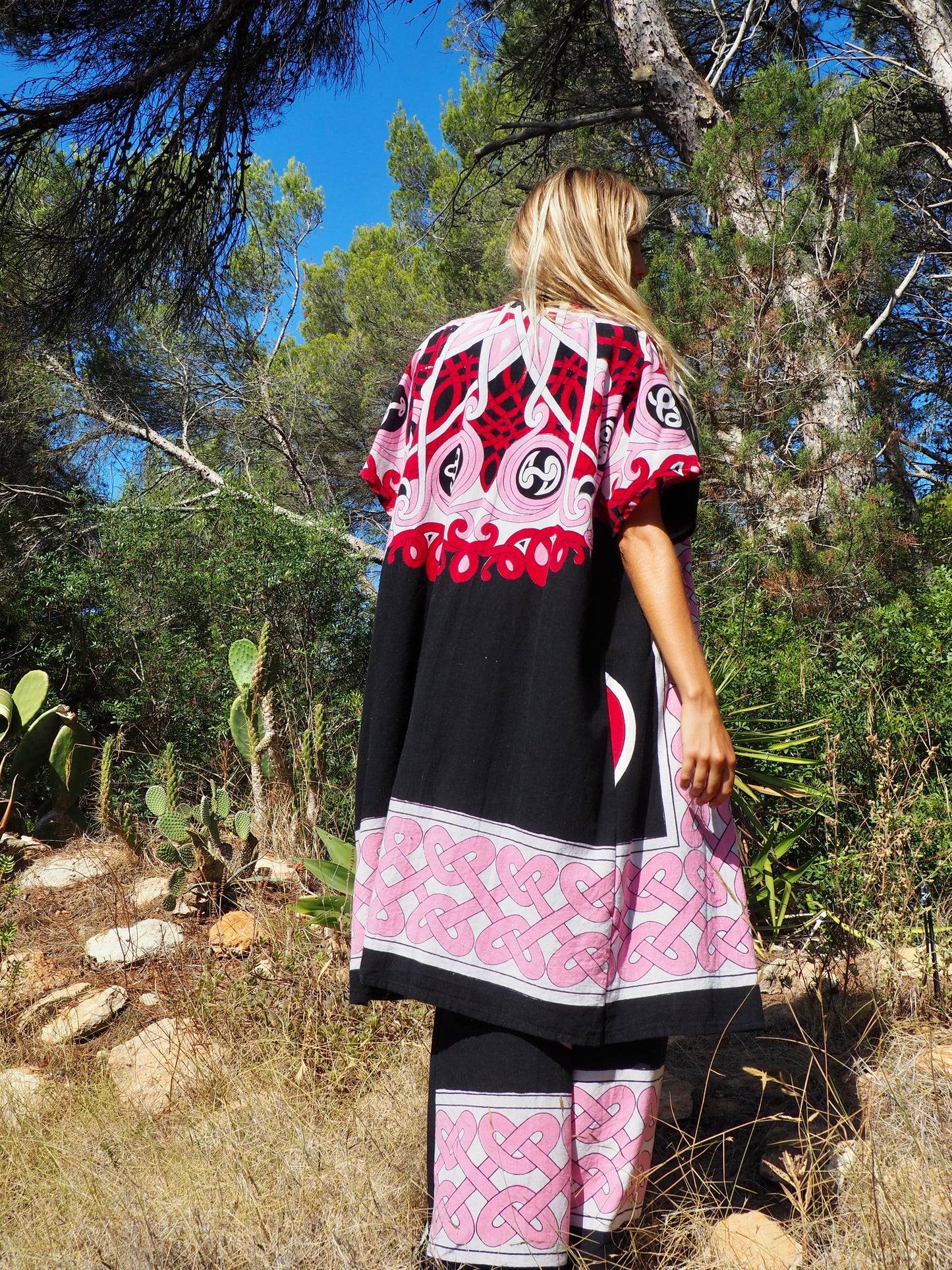 Up-cycled cotton short sleeve kimono jacket in pink and black with vibrant print design and circular motifs by Vagabond Ibiza