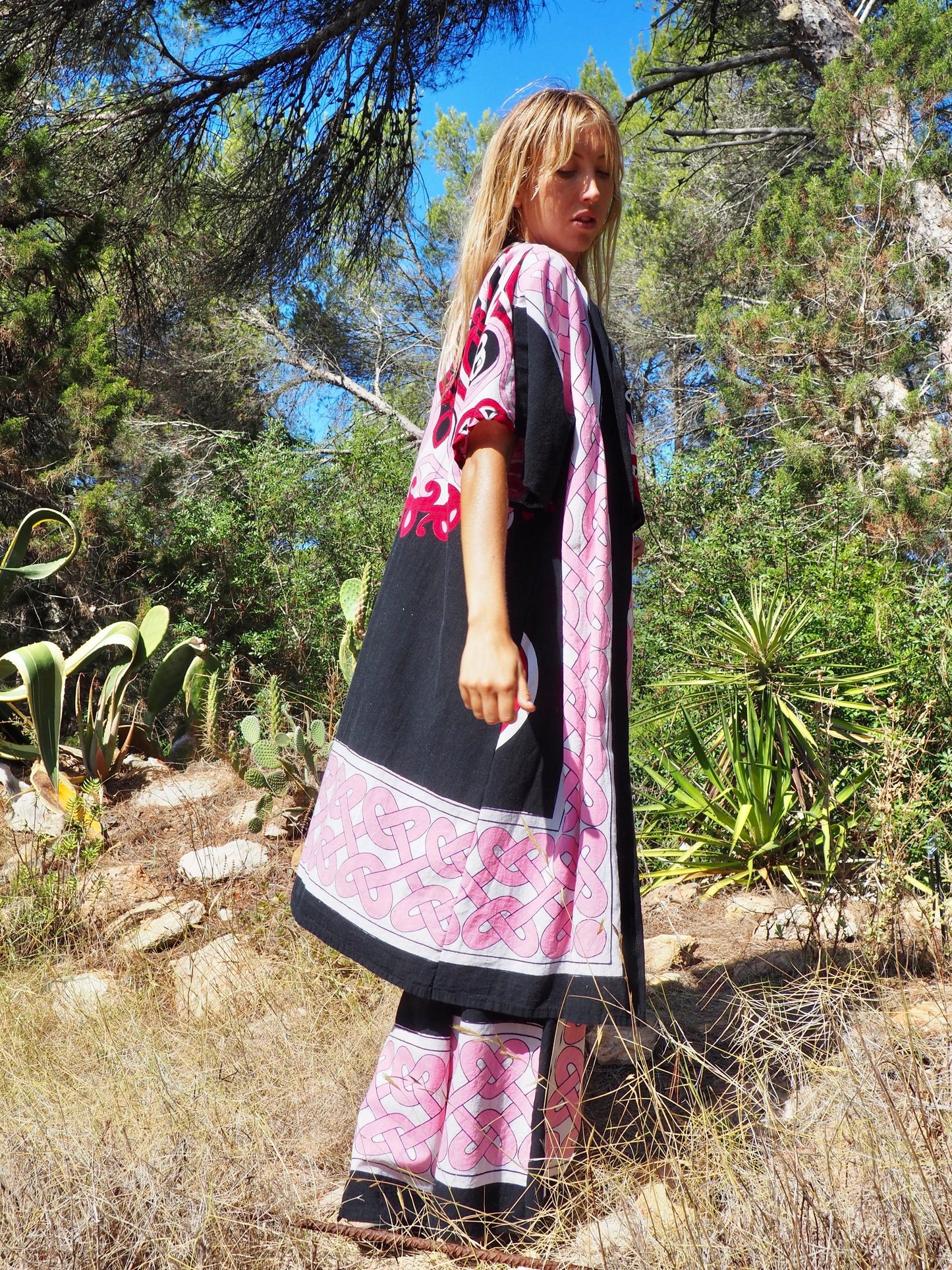 Up-cycled cotton short sleeve kimono jacket in pink and black with vibrant print design and circular motifs by Vagabond Ibiza