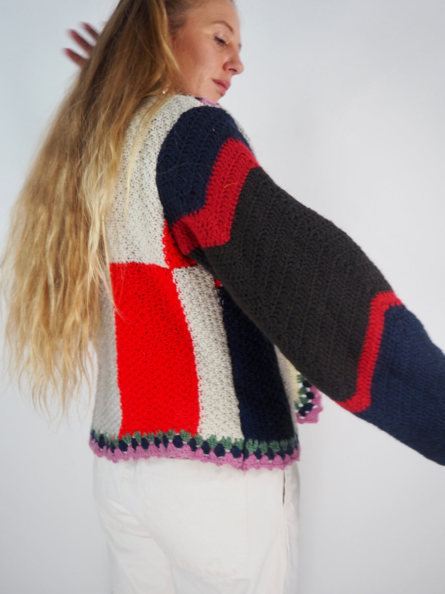 This one-of-a-kind vintage jacket is a true statement piece, crafted from a mix of cotton and wool crochet