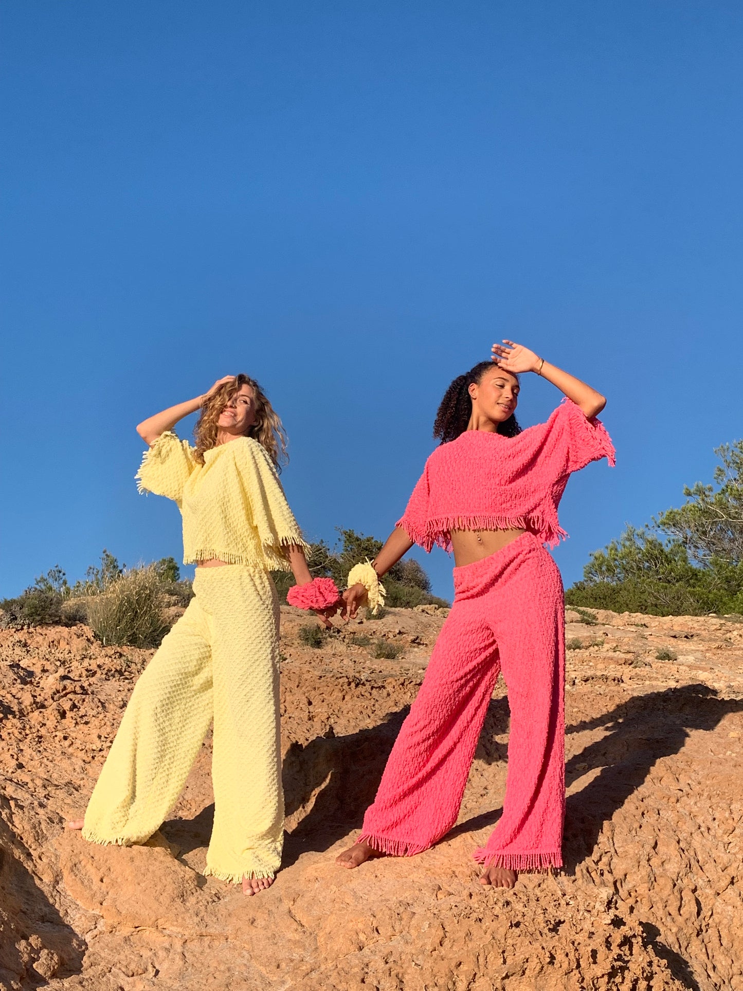 Upcycled bright yellow vintage cotton towel two-piece set with long sleeve top and wide-leg trousers.