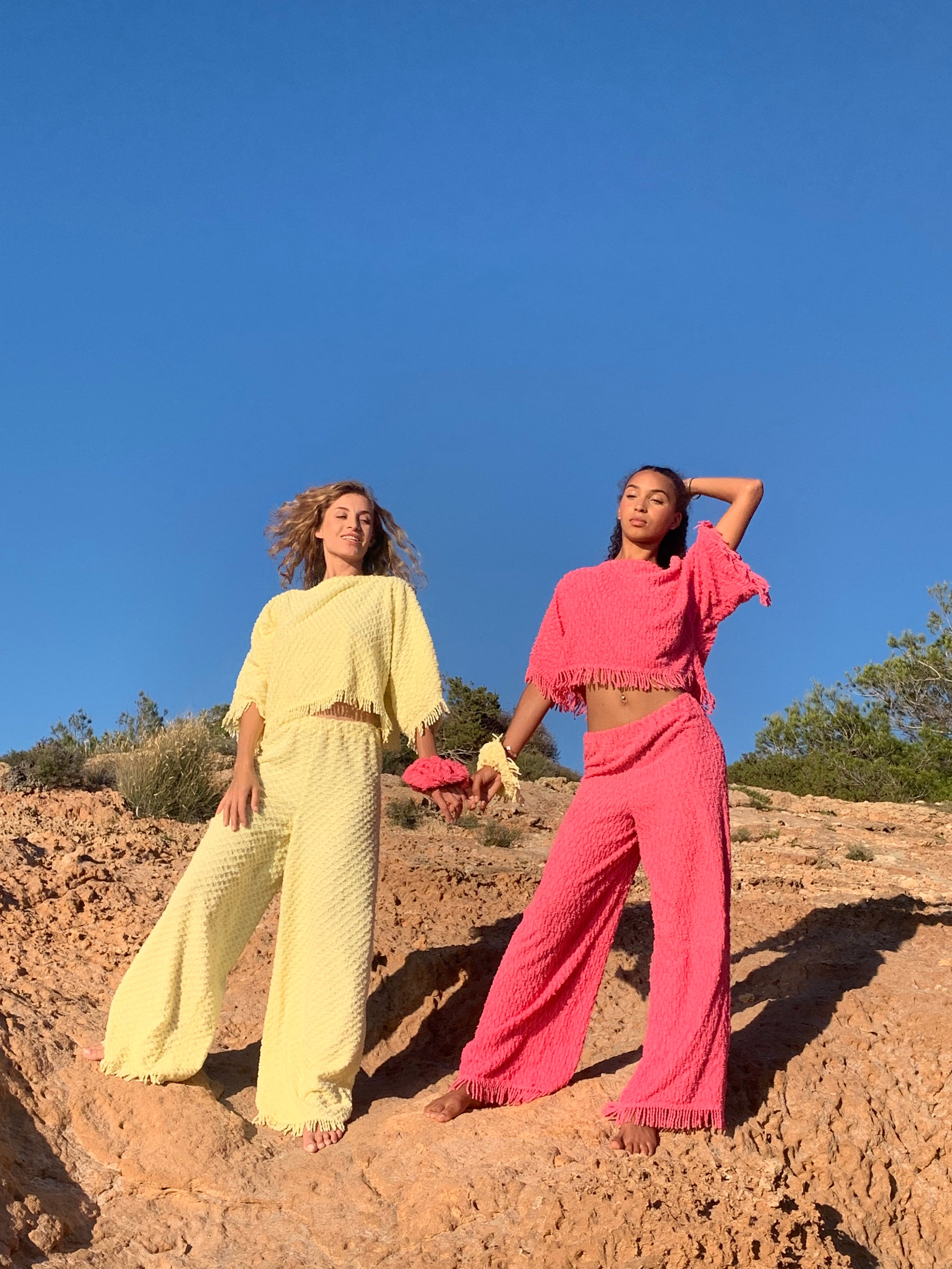 Upcycled bright yellow vintage cotton towel two-piece set with long sleeve top and wide-leg trousers.