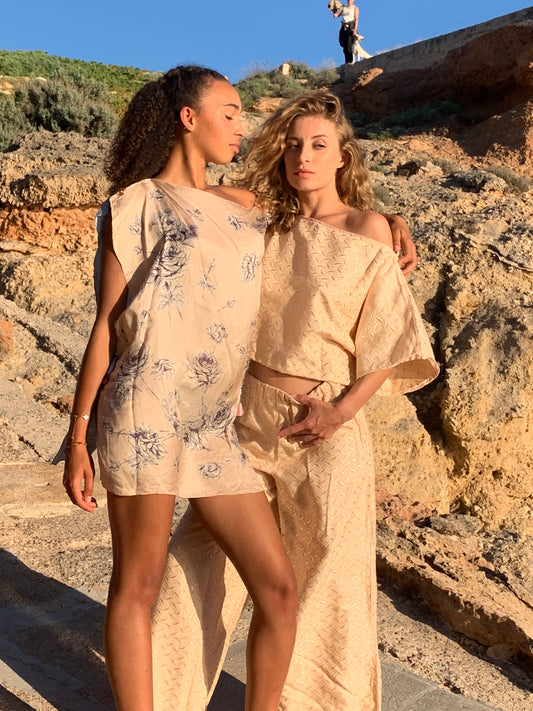 Vintage silk scarf dress in blue and cream tones with flowing hem and relaxed bohemian fit
