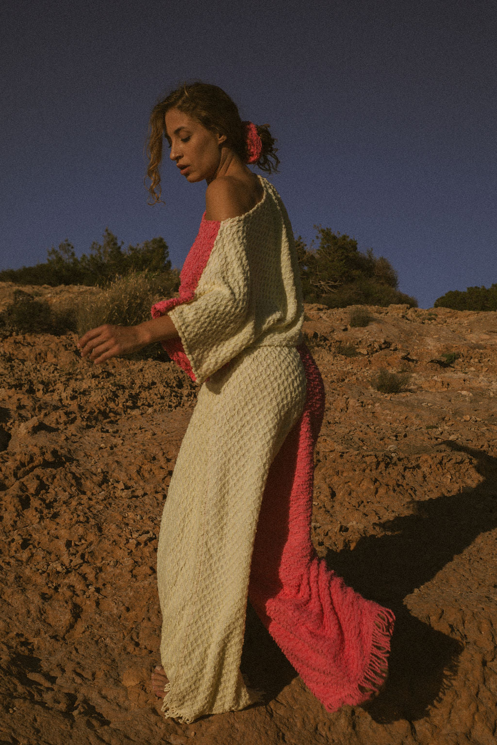 Handmade pastel patchwork towel set in pink and yellow, featuring long sleeve top and wide-leg trousers, upcycled in Ibiza.
