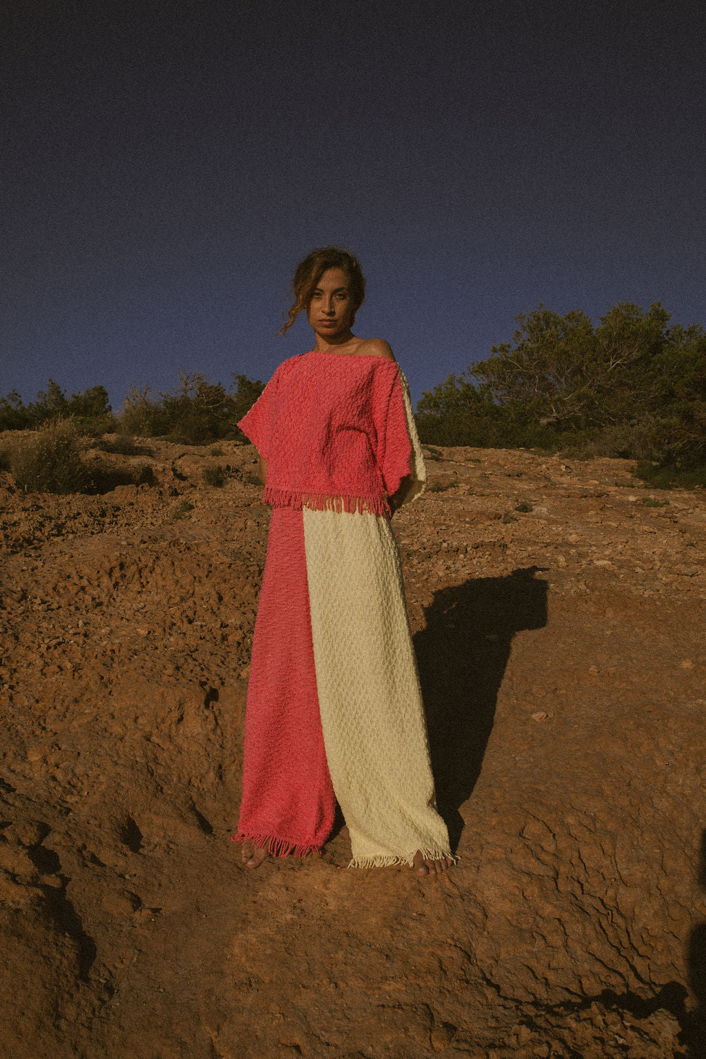 Handmade pastel patchwork towel set in pink and yellow, featuring long sleeve top and wide-leg trousers, upcycled in Ibiza.
