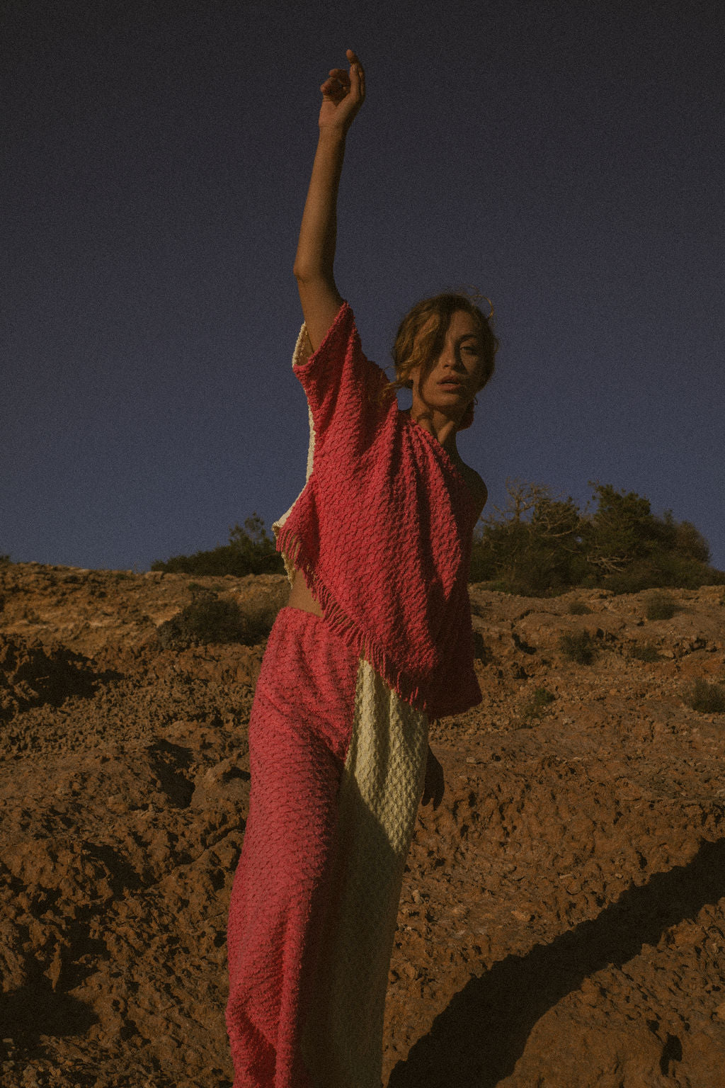 Handmade pastel patchwork towel set in pink and yellow, featuring long sleeve top and wide-leg trousers, upcycled in Ibiza.
