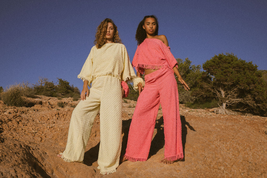 Upcycled bright yellow vintage cotton towel two-piece set with long sleeve top and wide-leg trousers.