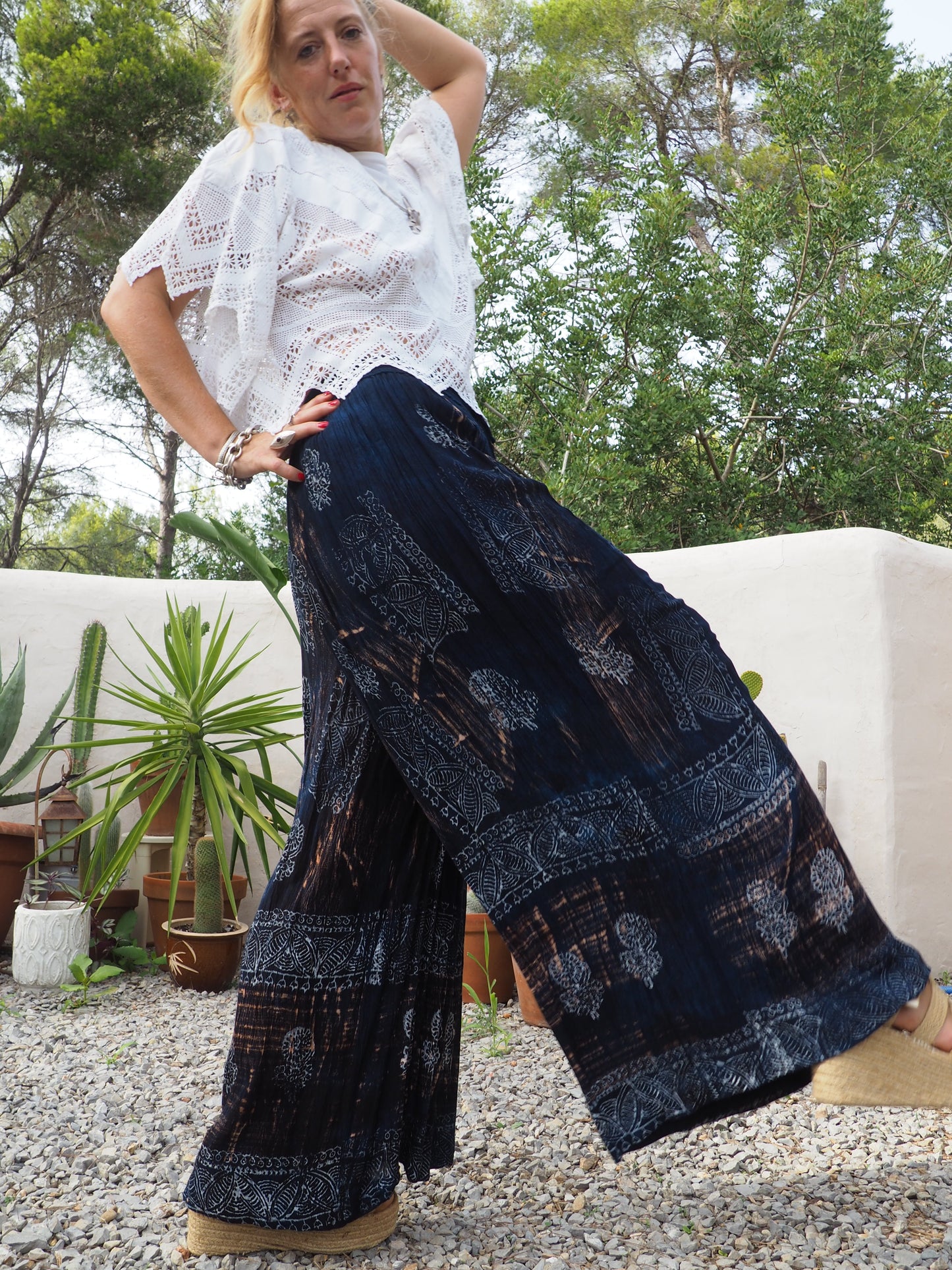 Vintage Indian fine thin cotton navy blue really wide leg pants with gold motifs and elasticated waist.