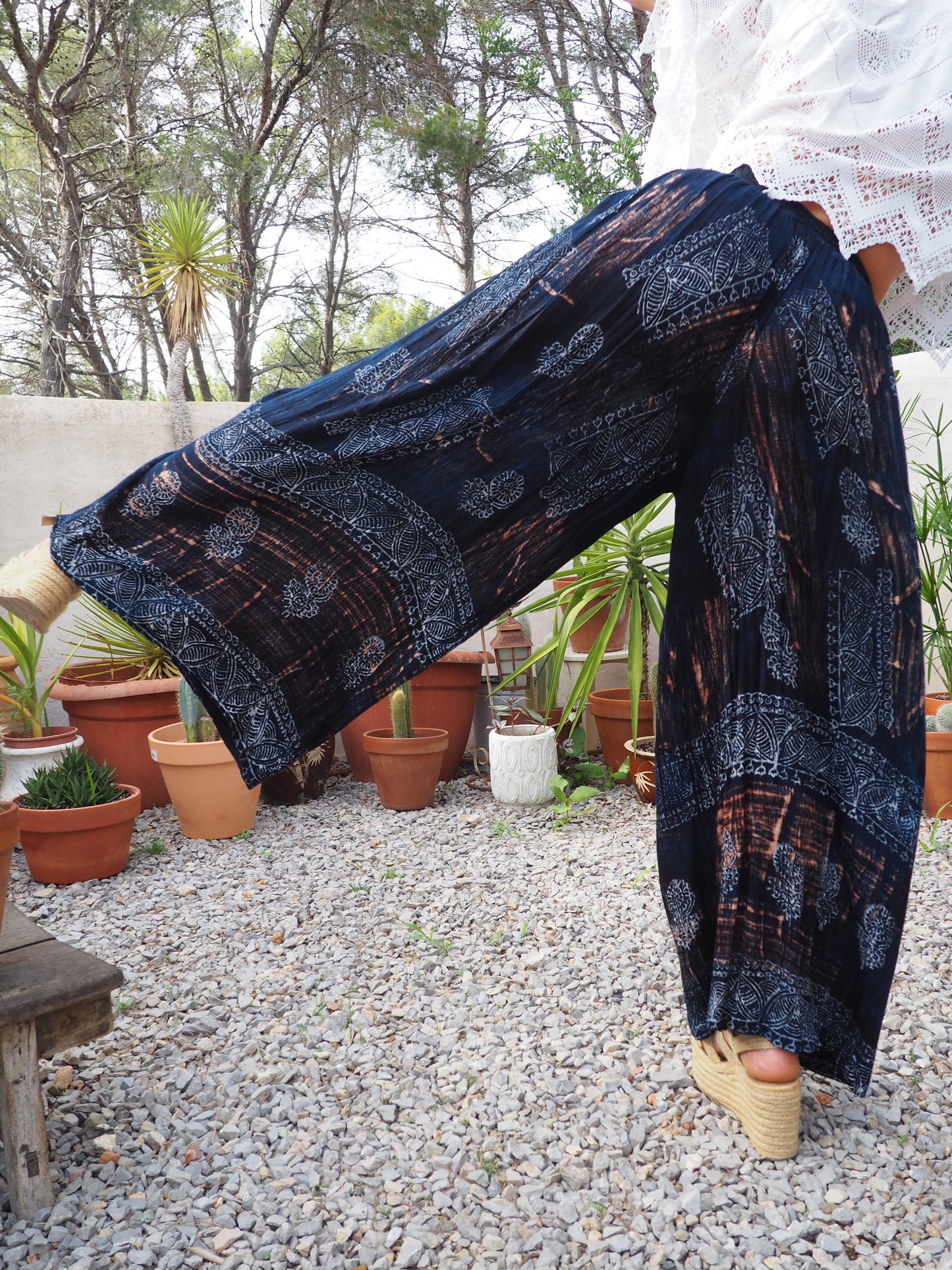 Vintage Indian fine thin cotton navy blue really wide leg pants with gold motifs and elasticated waist.