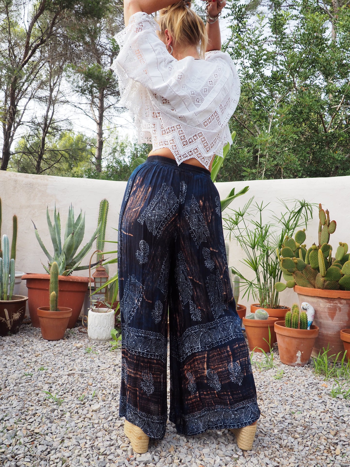 Vintage Indian fine thin cotton navy blue really wide leg pants with gold motifs and elasticated waist.