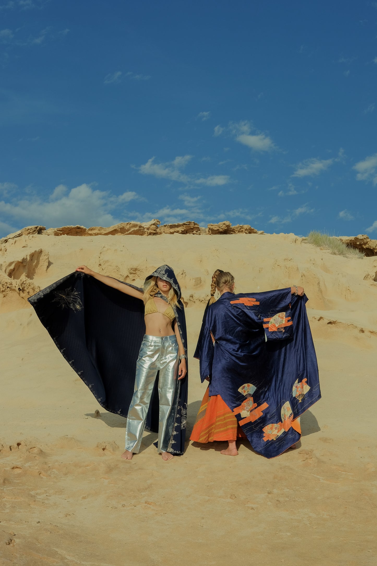 Vintage original silk Japanese kimono with traditional hand painted design in dark blue and orange tones