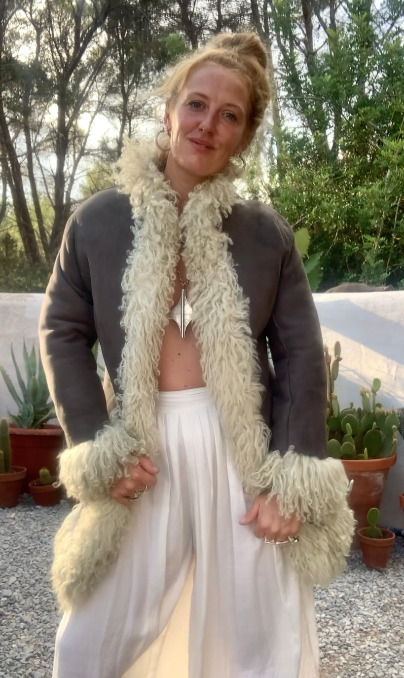 Vintage Classic 1970’s reversible Afghan sheepskin jacket has some small signs of ages some small hole’s