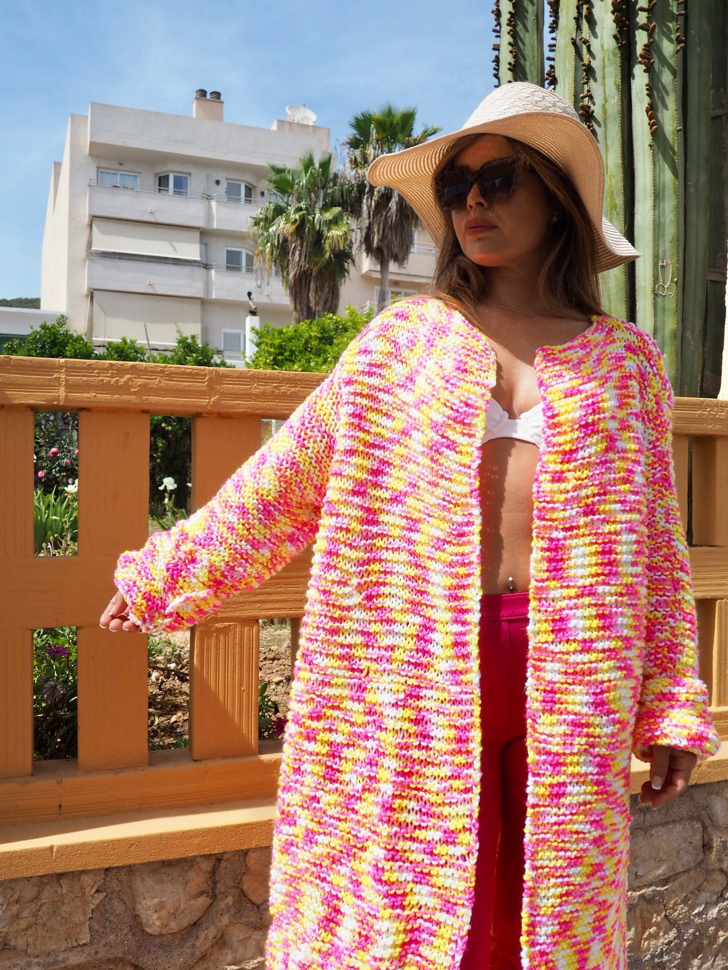 Hand knitted pink and yellow jacket made in ibiza by Vagabond Ibiza