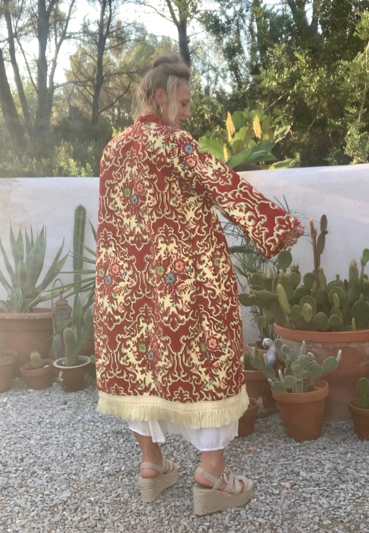 Vintage red and pastel yellow textiles with a burnet out devore Damascus pattern on the velvets pile very special textiles with tassel trim