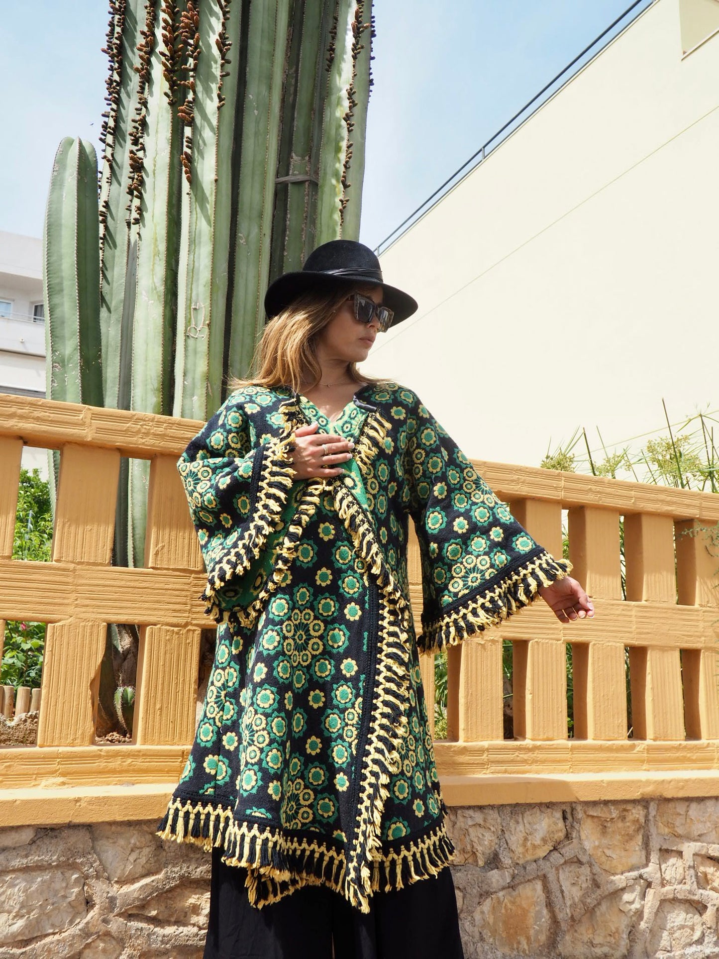 Stunning vintage 1970’s black and green tapestry jacket cut on the bias with bell sleeves made by Vagabond Ibiza