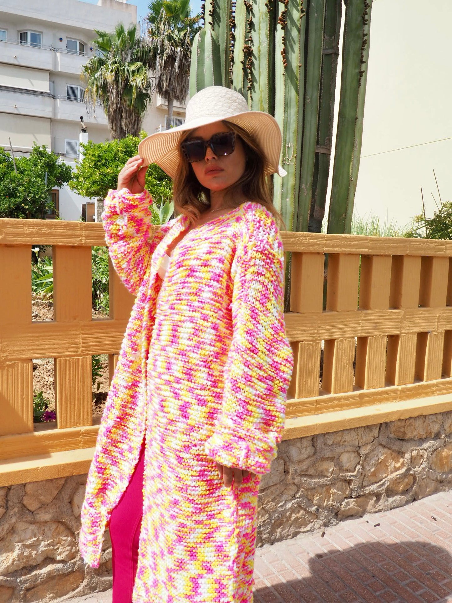 Hand knitted pink and yellow jacket made in ibiza by Vagabond Ibiza